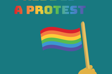 PRIDE IS A PROTEST is written in rainbow text against a blue background above a hand holding a pride flag